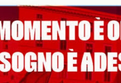 scritta "il momento è ora, il bisogno è adesso" dalla locandina dellUnione Sindacati di Base